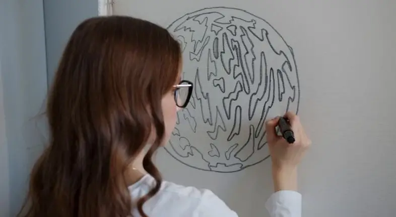 drawing a design on tufting cloth