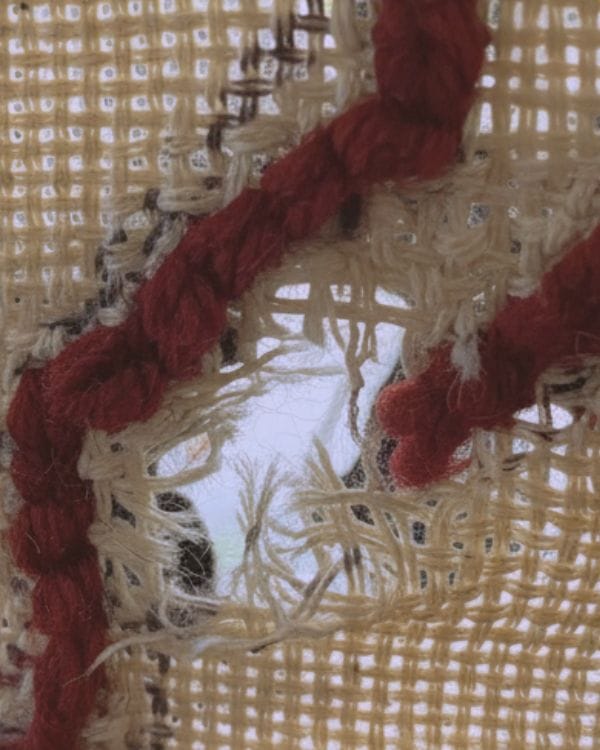 ripped tufting close up image of a rip in a tufting cloth